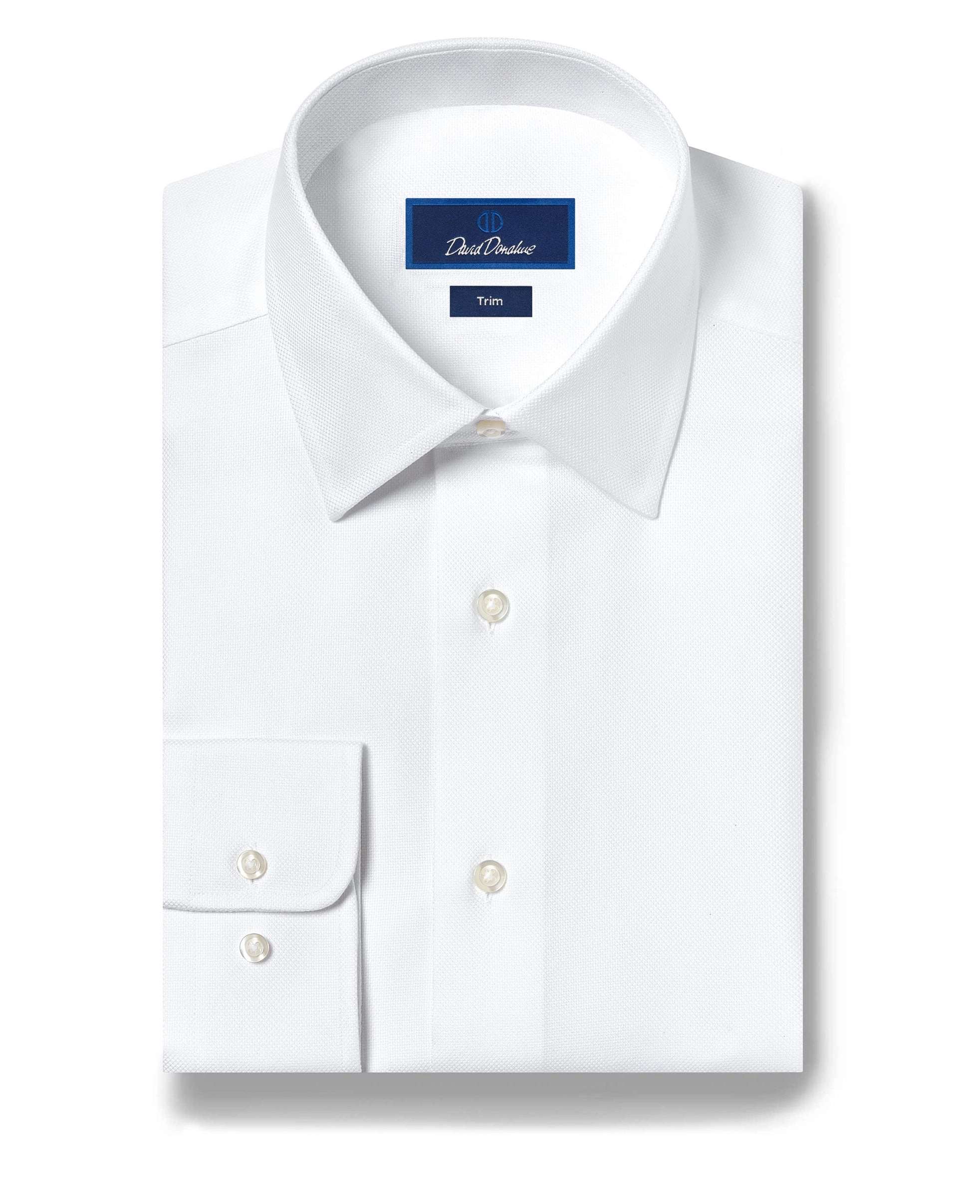 A white barrel cuff dress shirt laid flat