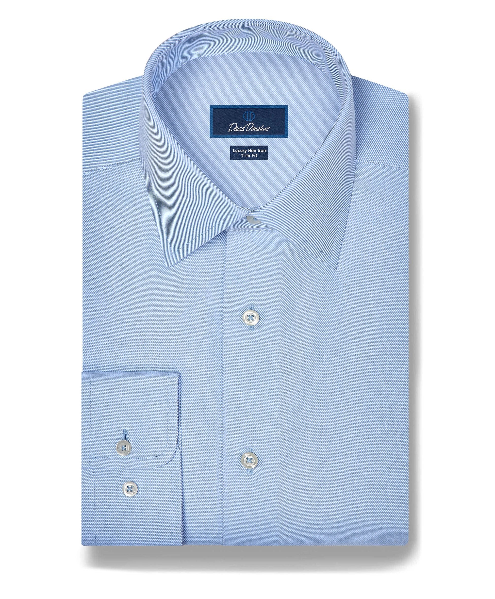 A light blue dress shirt laid flat
